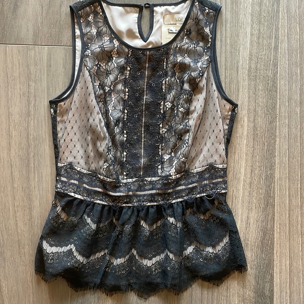 Brand new with tags womens blouse. Size XXSmall.